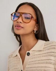 Le Specs Ruskea – Tragic Magic blue Light