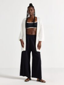 Lindex Pitkä neuletakki jossa lyhyt hiha