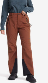 RevolutionRace > Housut > Sade- Ja Kuorihousut – Punainen – Cyclone Zip-up 3L Pants Naiset Smoked Paprika, Koko:XS