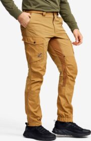 RevolutionRace Ulkoiluhousut, Vaellushousut & Retkeilyhousut – Keltainen – Rambler Lightweight Pro Pants Miehet Dijon, Koko:2XL